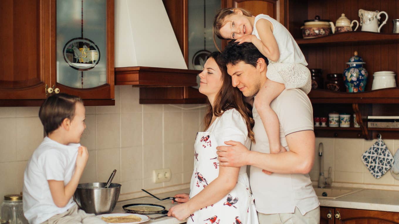 family cooking breakfast together