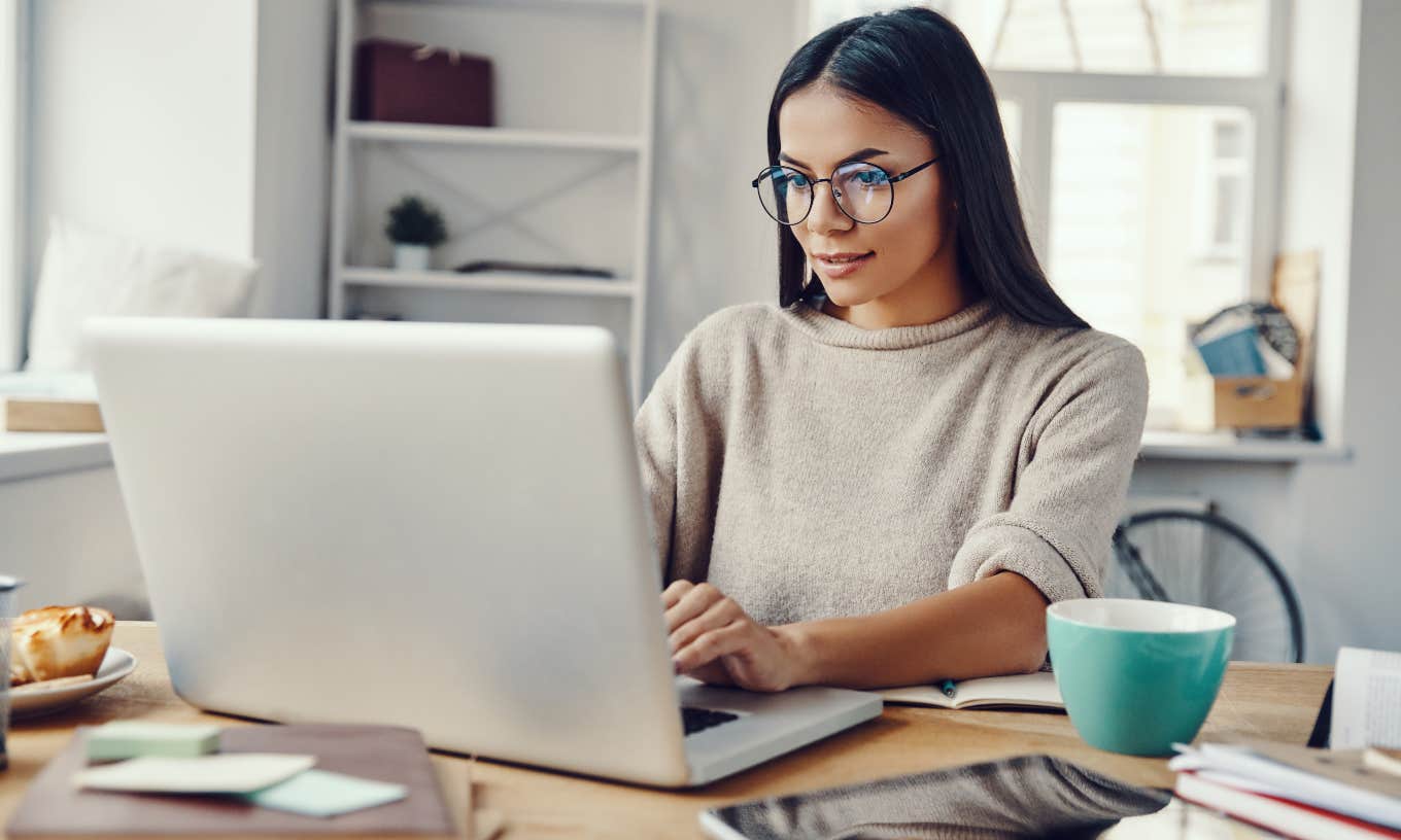 woman working on laptop at home