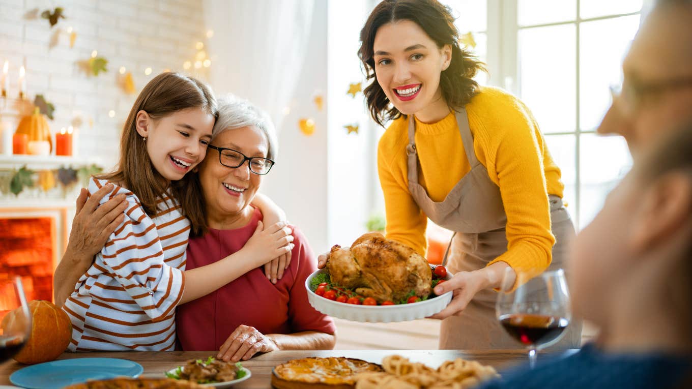 Family sitting at the table and celebrating holiday.