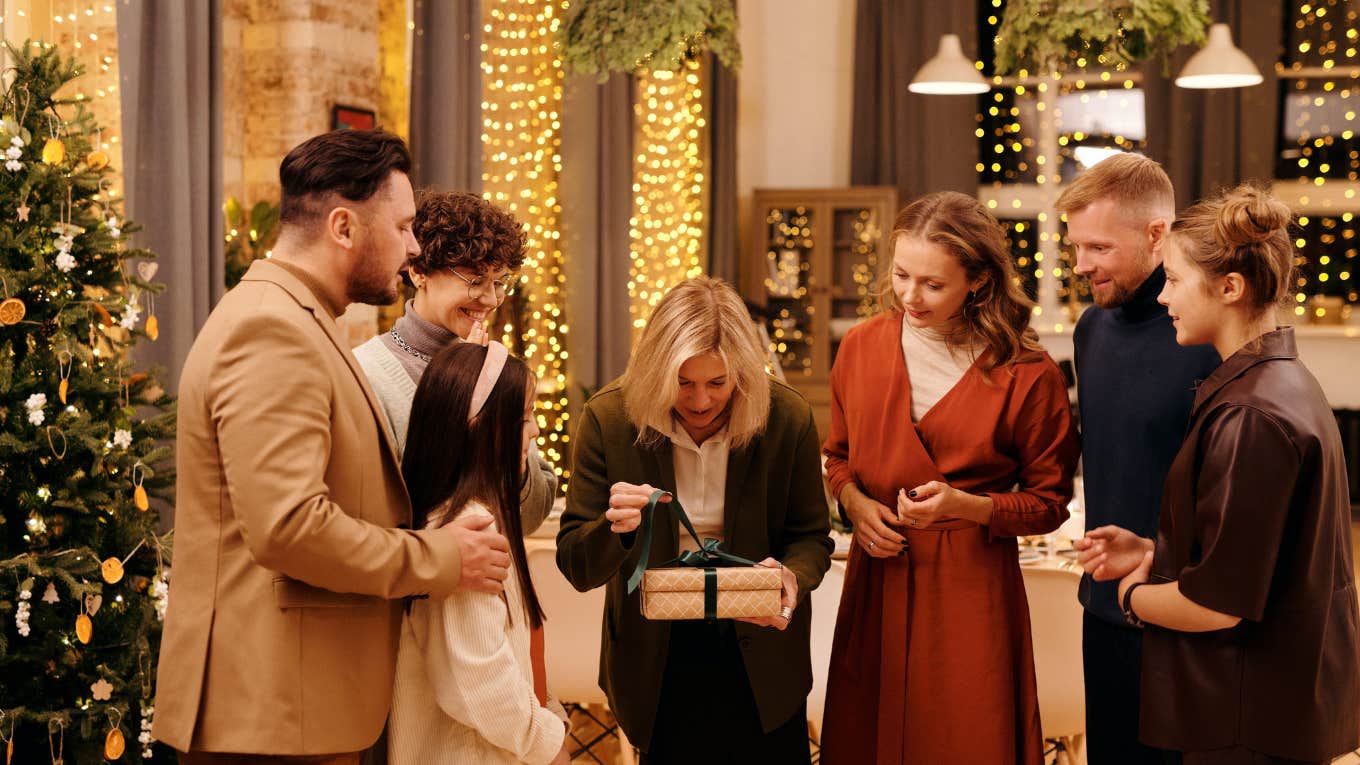 Woman Hands Mother-In-Law A Thoughtful Gift On Christmas But She Refused To Open It family at christmas opening gifts