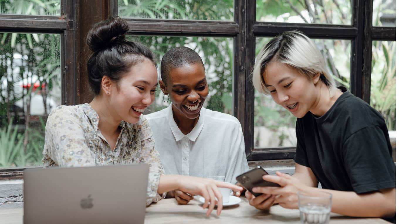 three people with laptop and phone 