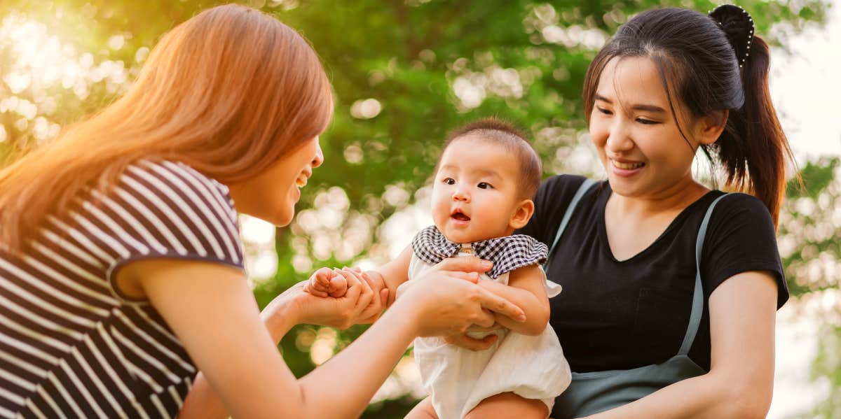 Woman introducing her niece to her friend