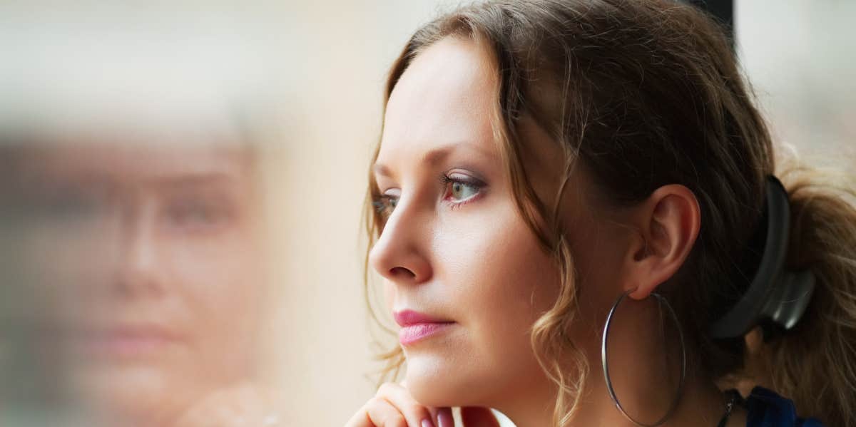 Woman looking out the window