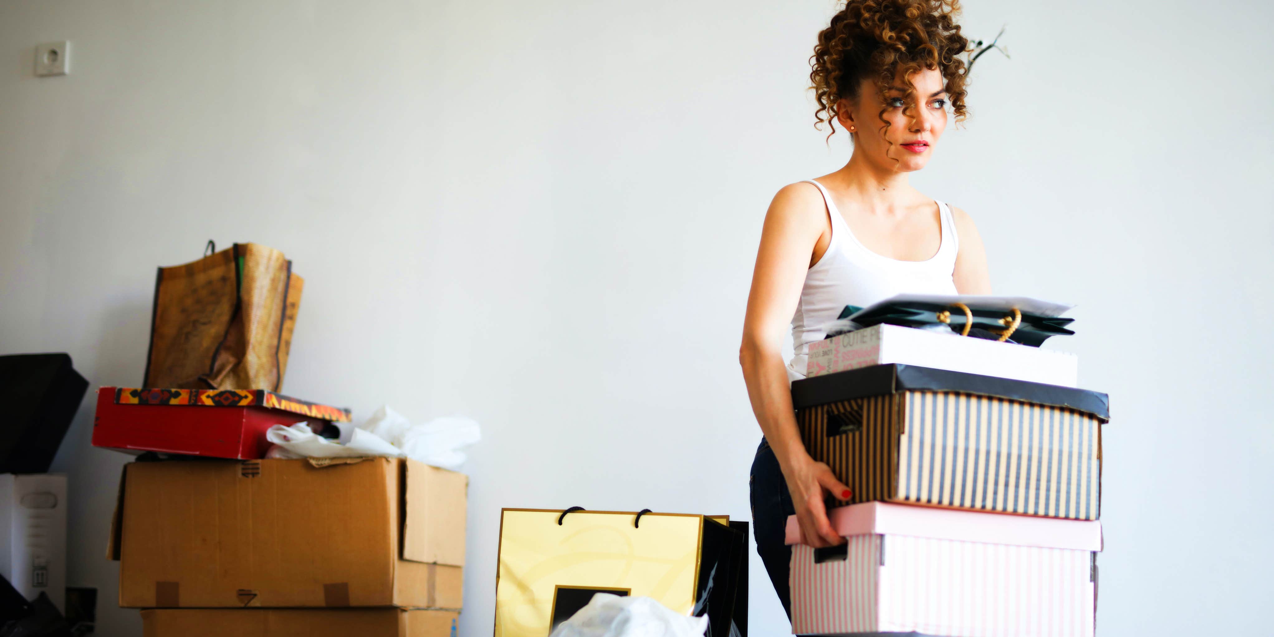 Woman lifting boxes