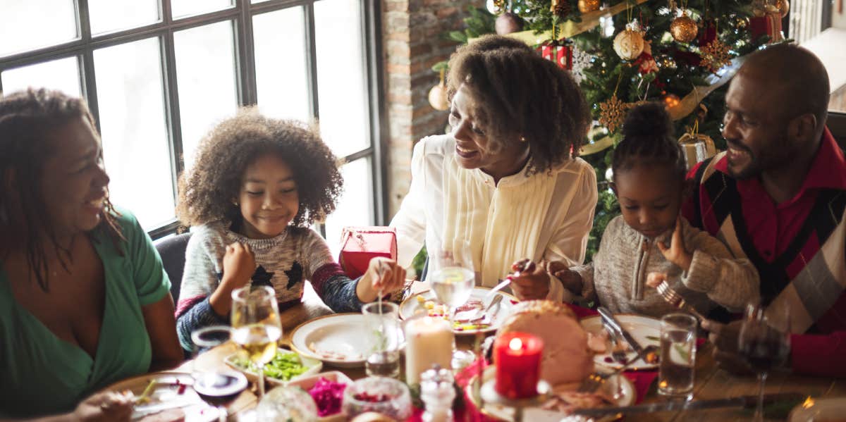 family eating Christmas dinner together