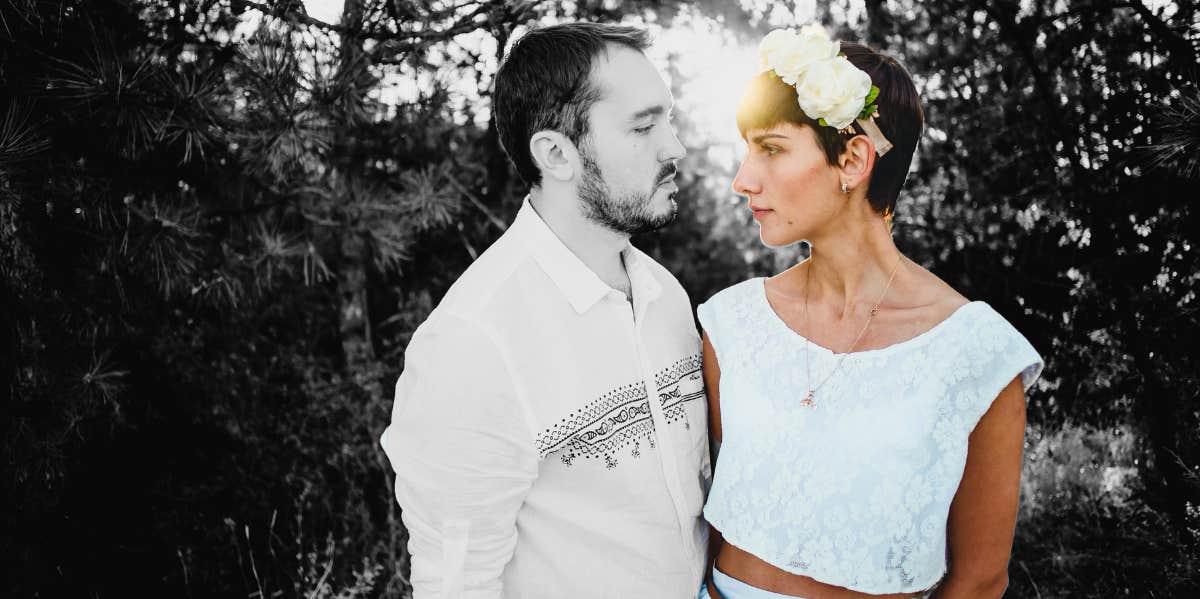Woman No Longer Attracted To Her Partner Isn't Sure She Should Leave Because She Wants Kids woman and man looking at each other
