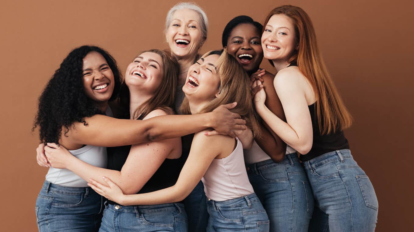 Woman Makes Fun Of What Fashion Companies Think Women In Their 40s Should Be Wearing group of women laughing and hugging
