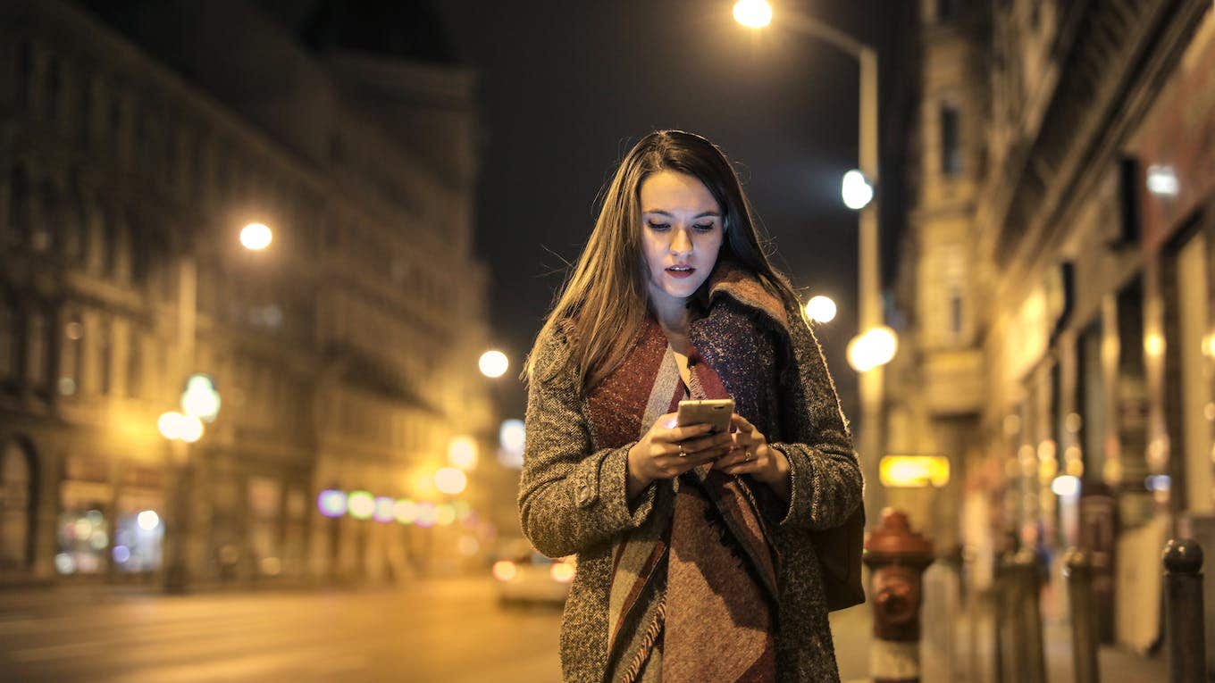 woman on the phone walking on the street