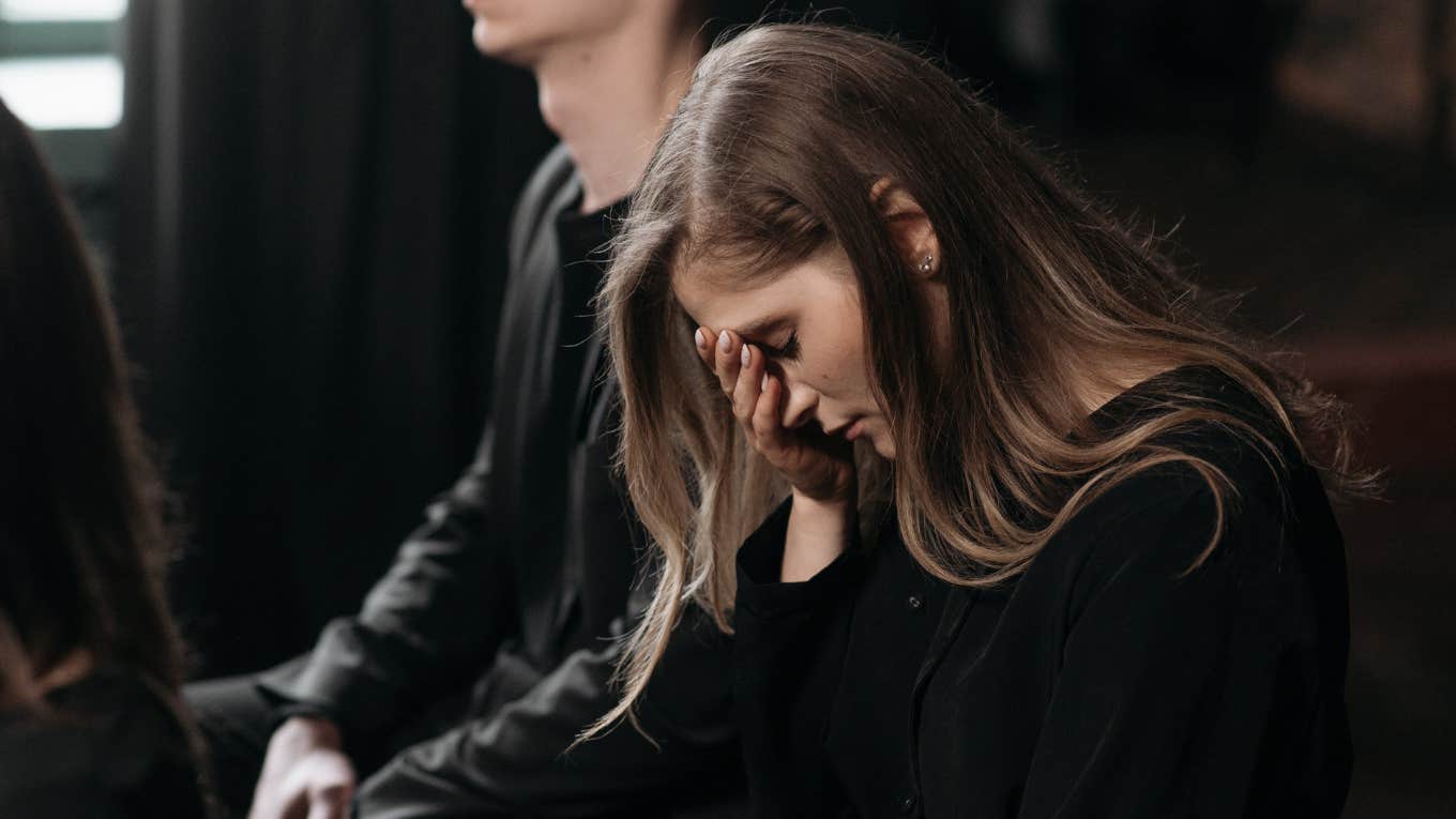 woman attending funeral 