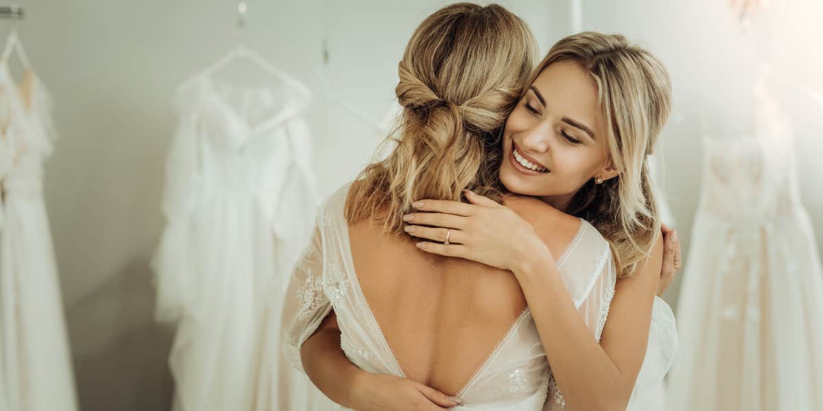 woman hugging bride