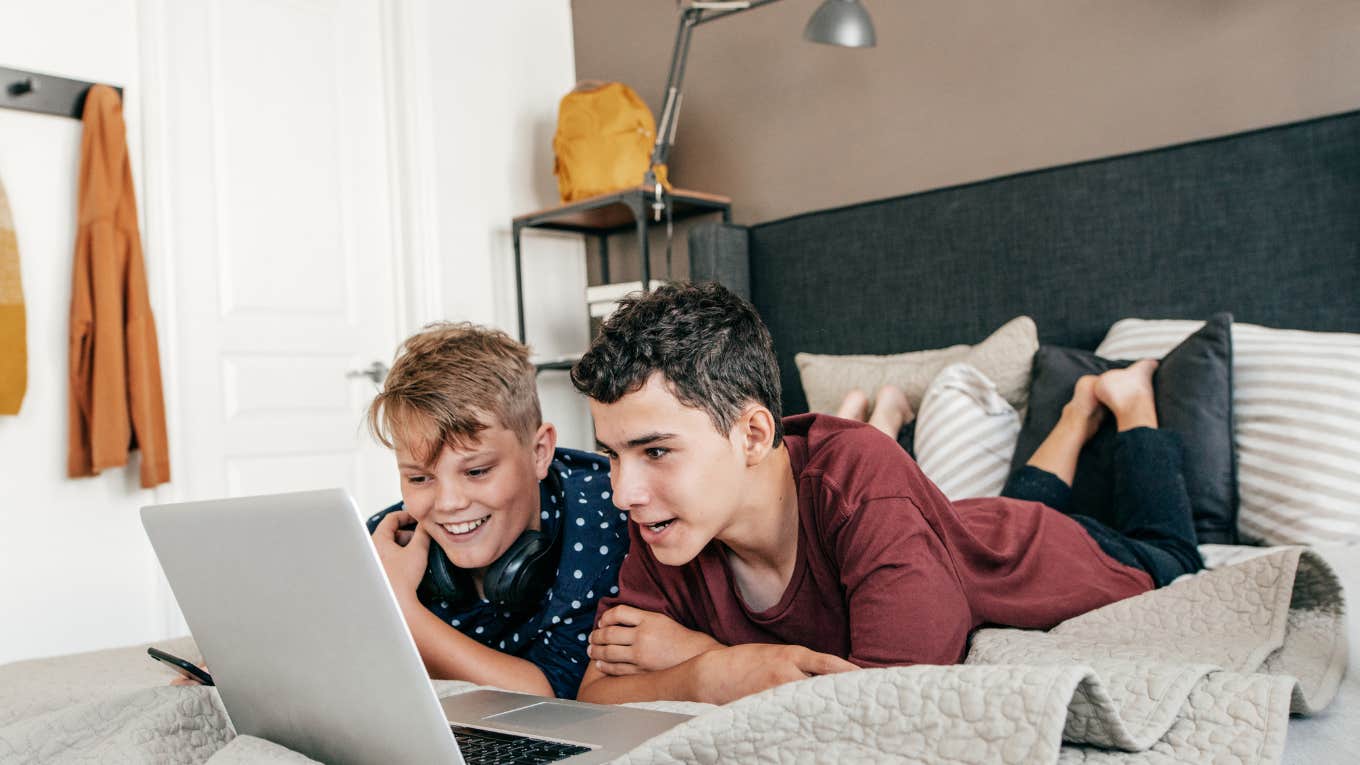 two tween boys on laptop