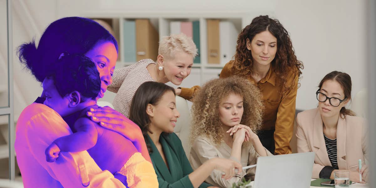 Woman holding baby, coworkers talking in office