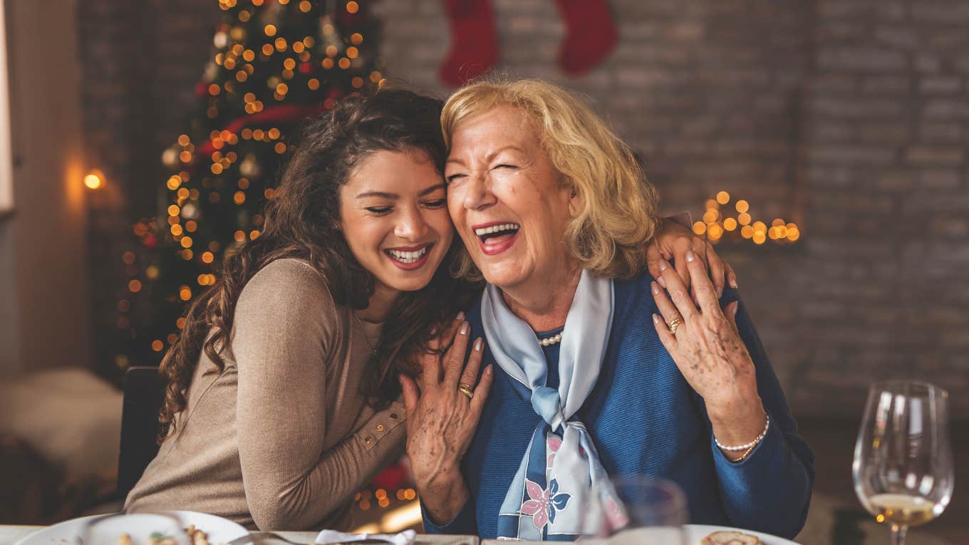 daughter hugging her mother and smiling