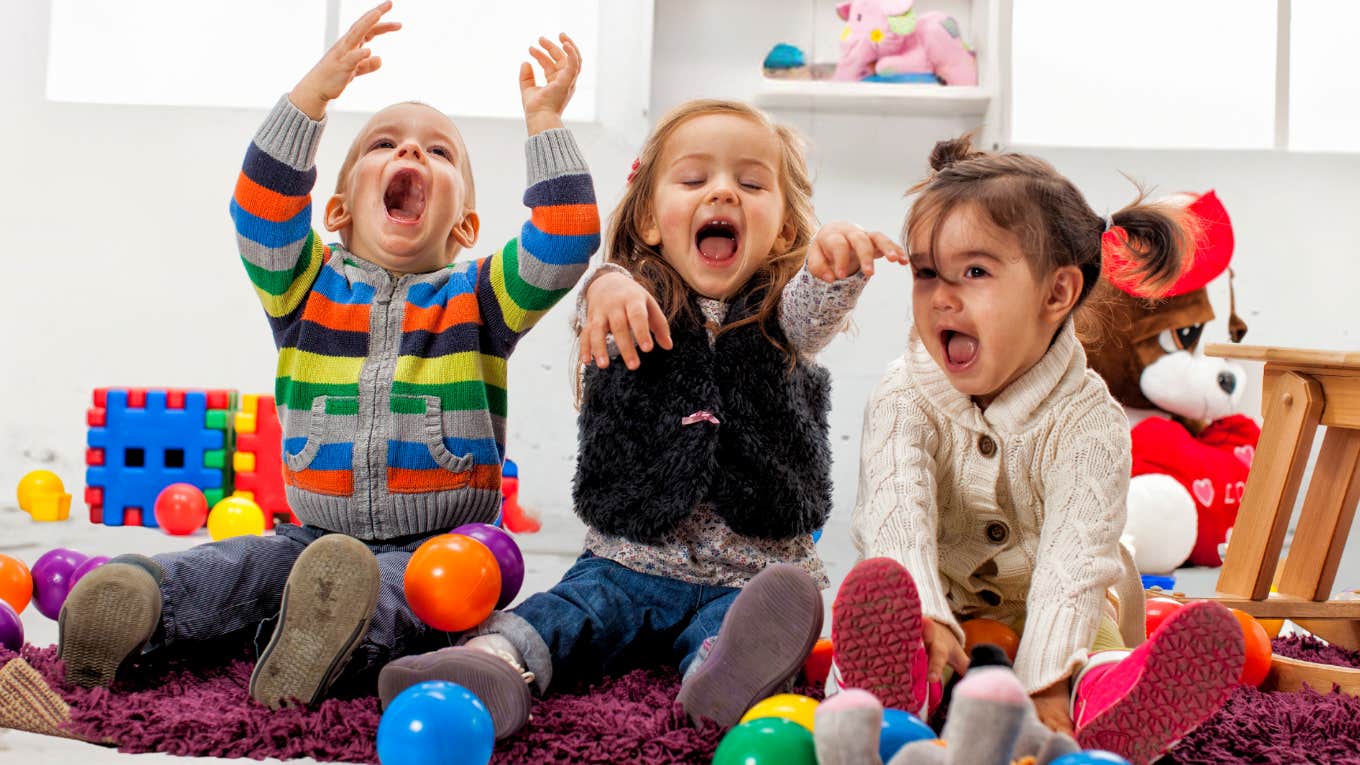 Kids playing and laughing at daycare. 