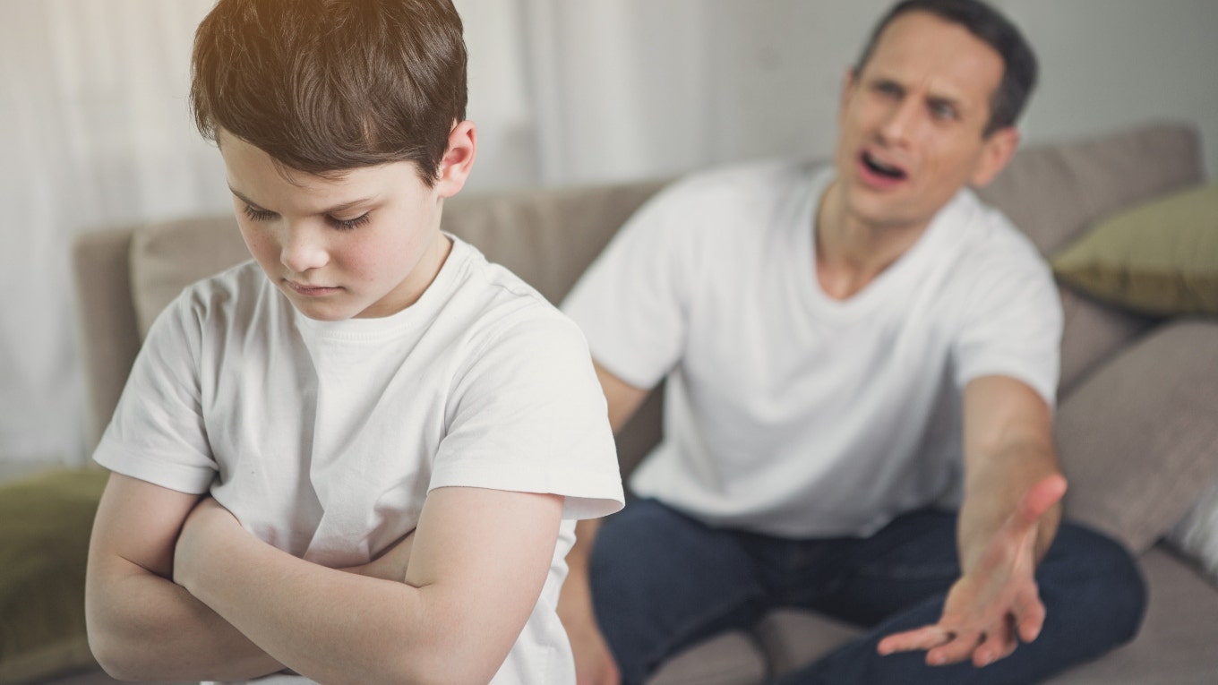 A father is shouting at his son