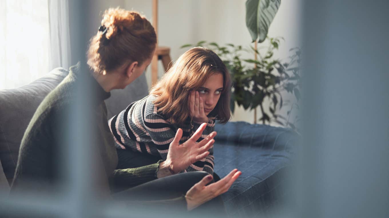 Teenage girl in difficult mood with angry mom.