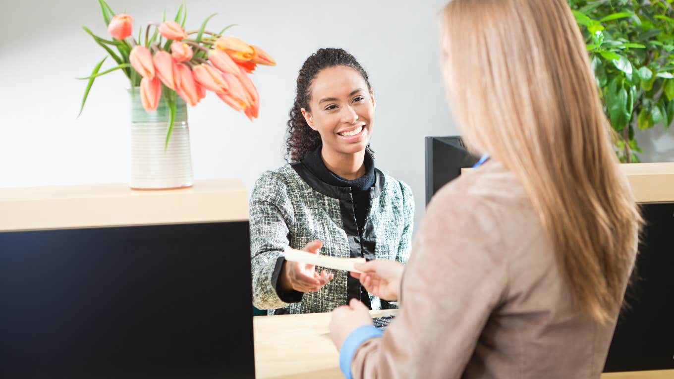 woman cashing check at bank