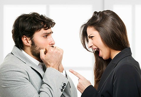 woman scolding man