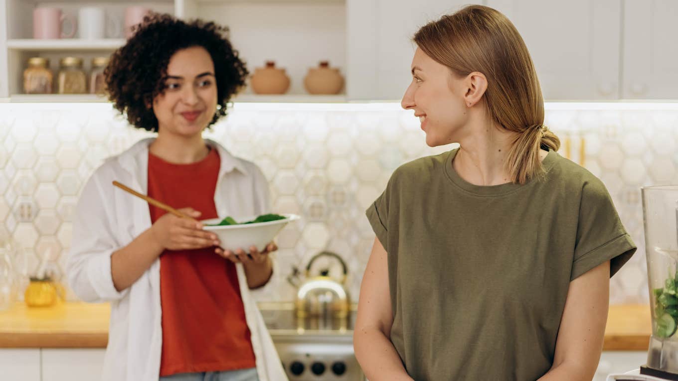 two women cooking together