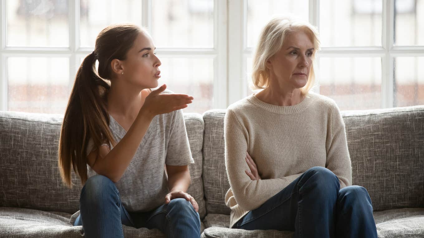 Frustrated (adult) daughter argues with her mother, displaying a generational divide between the women