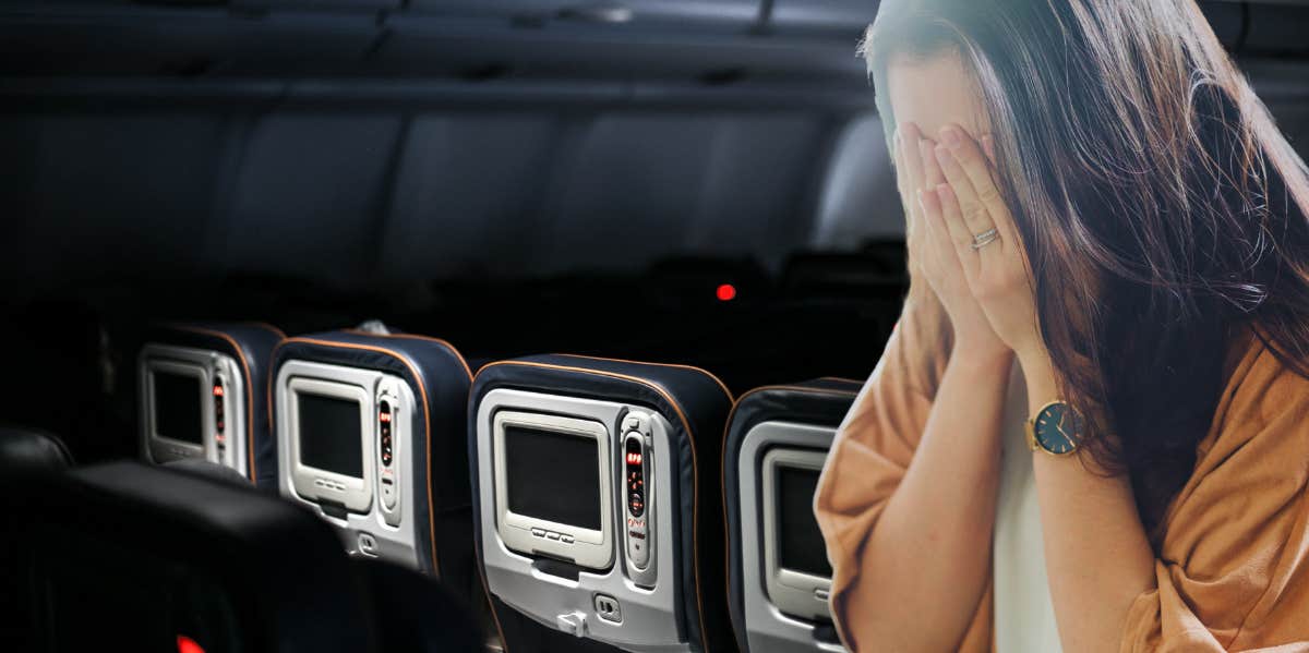 woman with hands over face and airplane interior