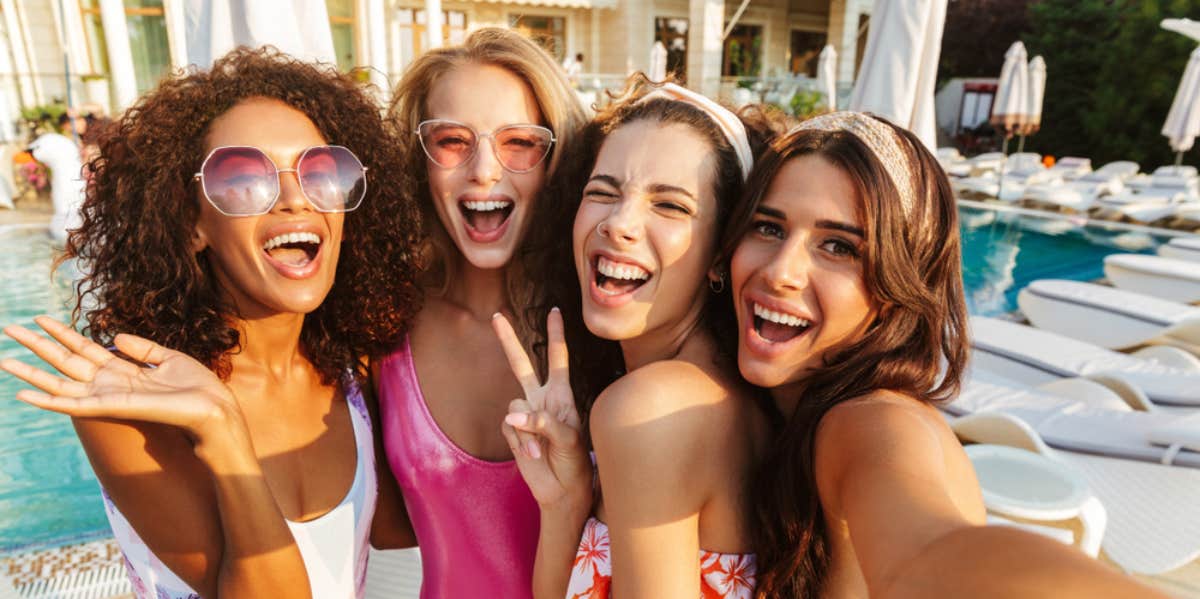 Woman Shamed After She Refused To 'Cover Up' At A Pool Party & Upsetting Another Guest 'Jealous' Of Her Body pool party with women smiling