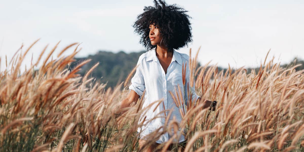 Woman walking in field