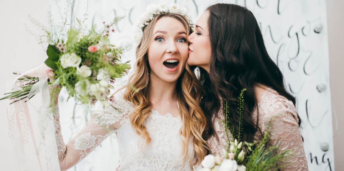 woman wears white dress to wedding