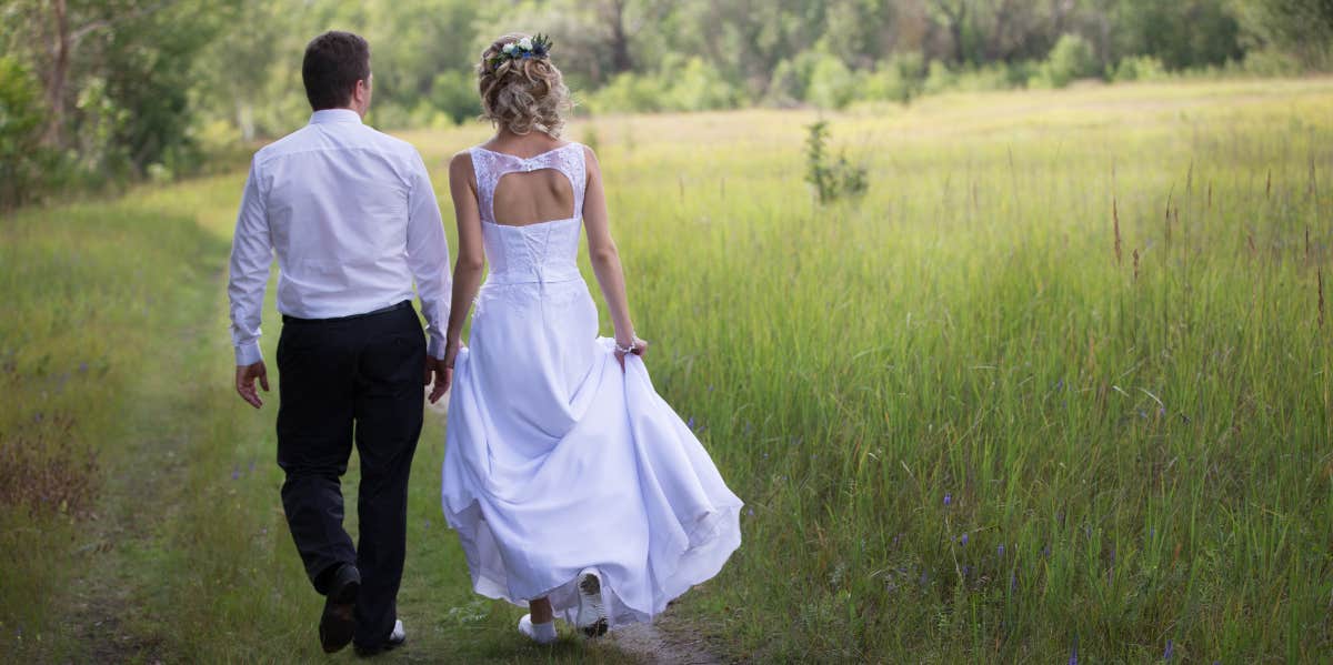 Woman walking in wedding dress