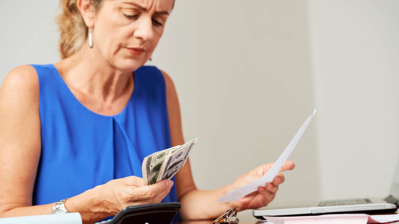 stressed woman counting money