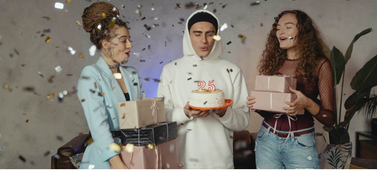 three people celebrating a birthday