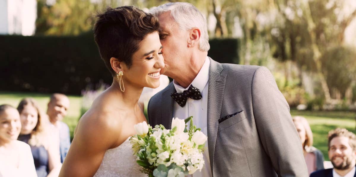 Bride with her father at her wedding