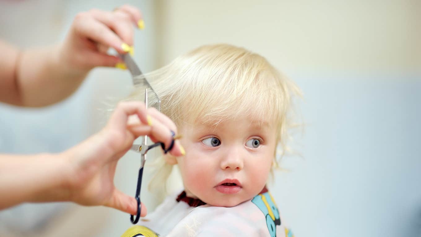 baby getting haircut