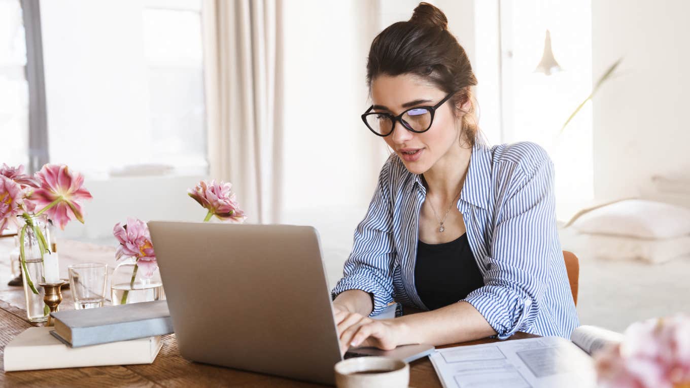 Woman working from home with a laptop. 