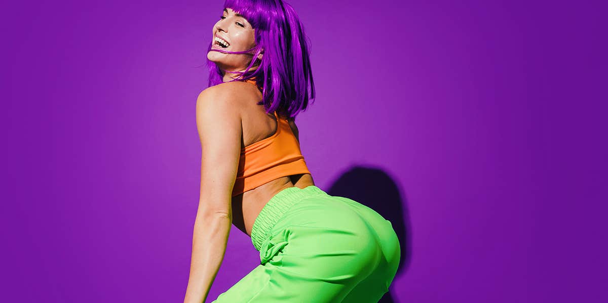 woman with purple hair dancing