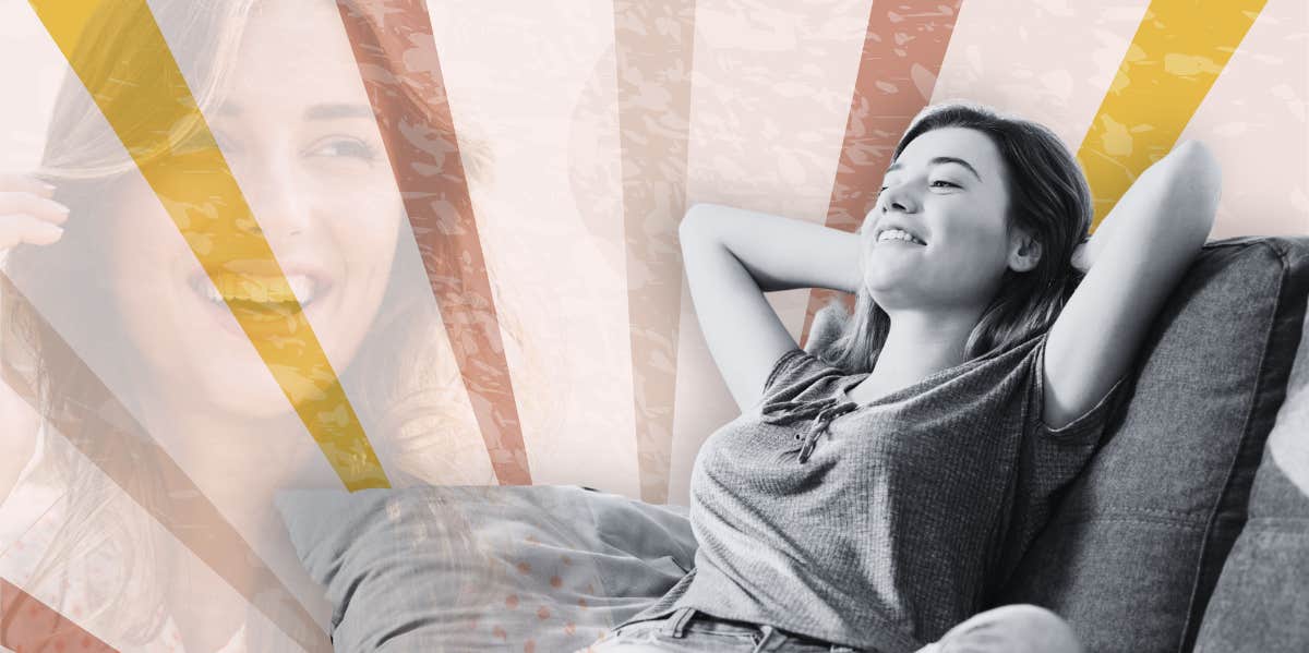 The Life Status That Makes Women Feel Happiest, According To Research Happy woman relaxing on the couch