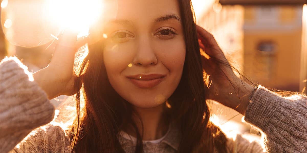 woman smiling outside