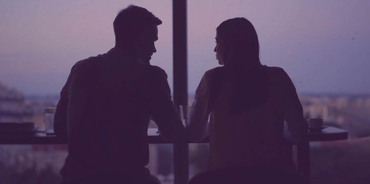 couple looking out window