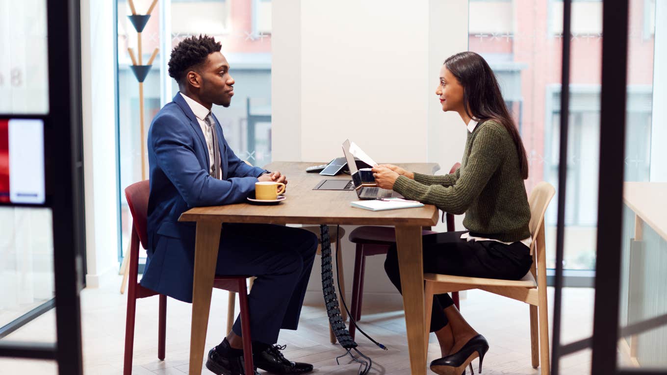 man in suit during job interview with recruiter