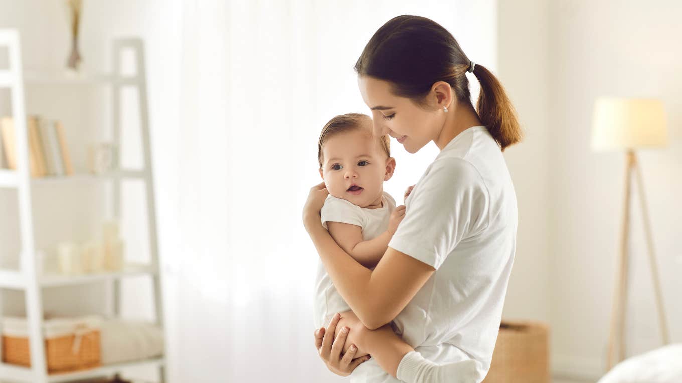 woman holding baby