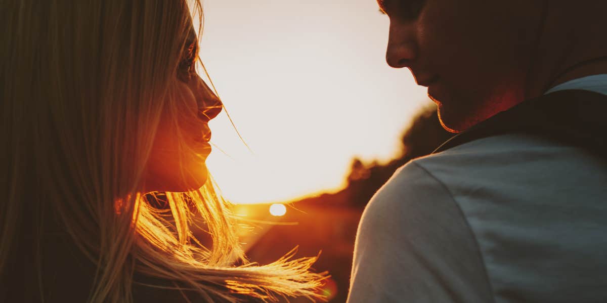 couple looking at each other during golden hour