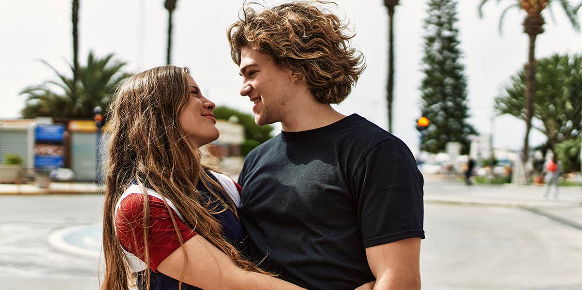A 3-Step Plan To Get The Girl Of Your Dreams (That Actually Works) smiling couple hugging
