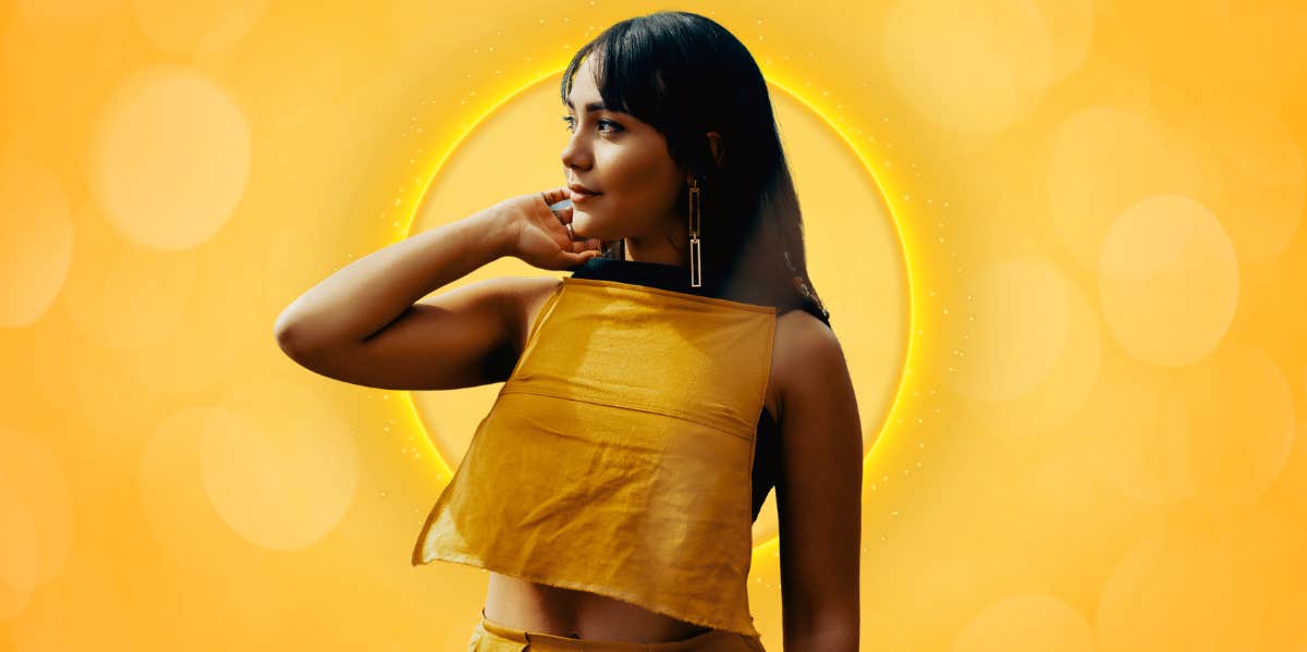 Yellow Aura Meaning: Personality Traits, Relationships & Career woman in yellow with yellow background