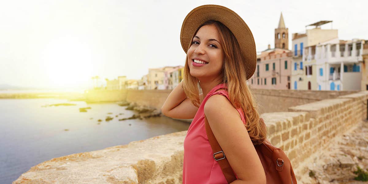 smiling woman traveling