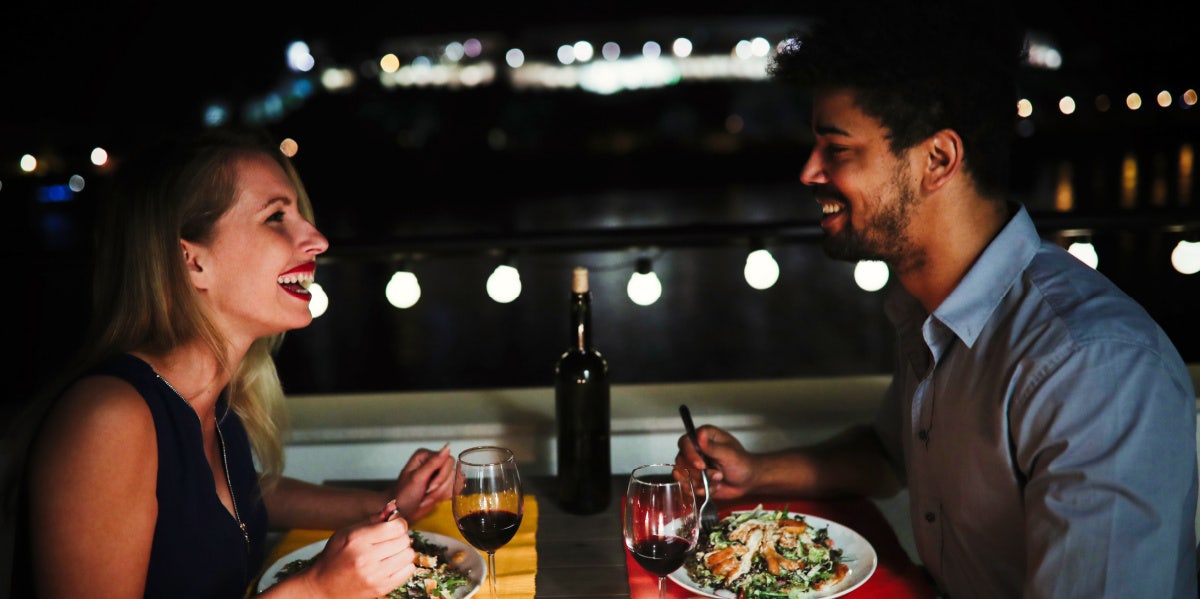 man and woman at dinner 