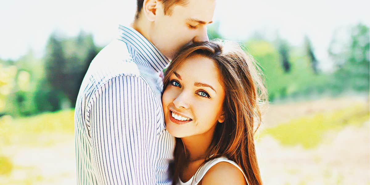 young happy couple in a field