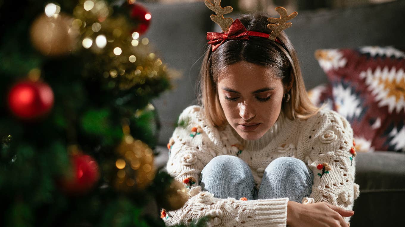 Young Woman Whose Dysfunctional Family Doesn’t Prioritize The Holidays Spends Christmas Morning Alone sad woman alone on christmas morning