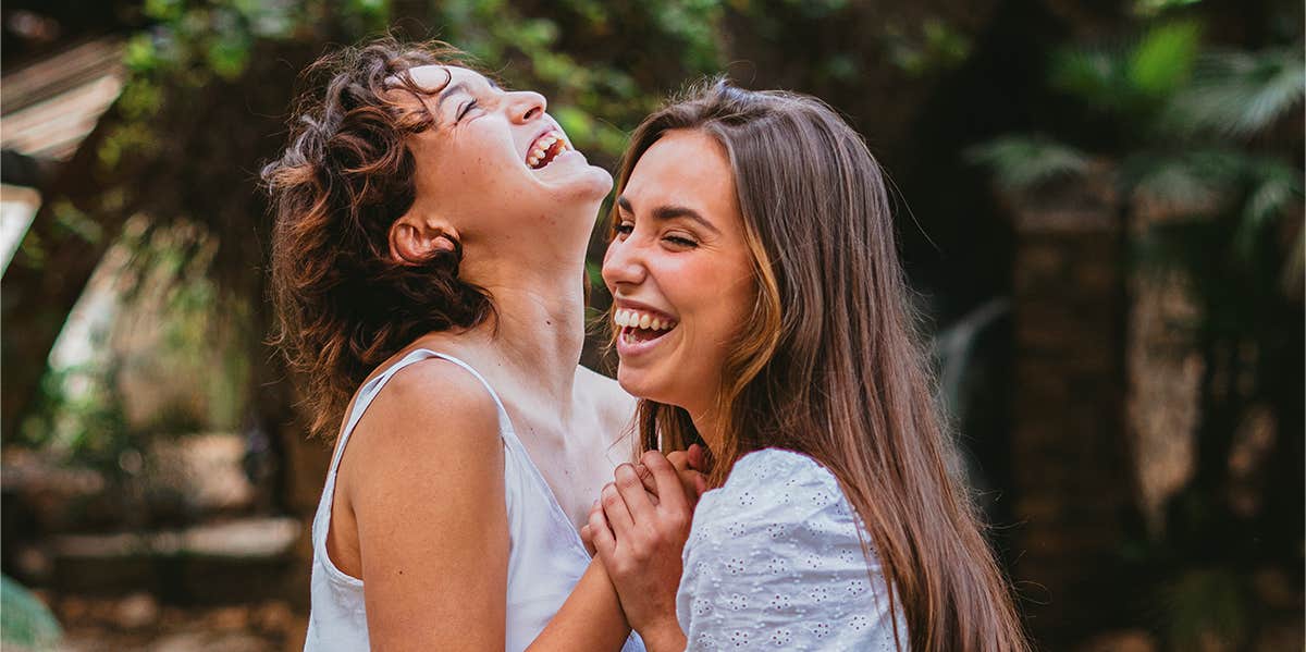 two sisters laughing