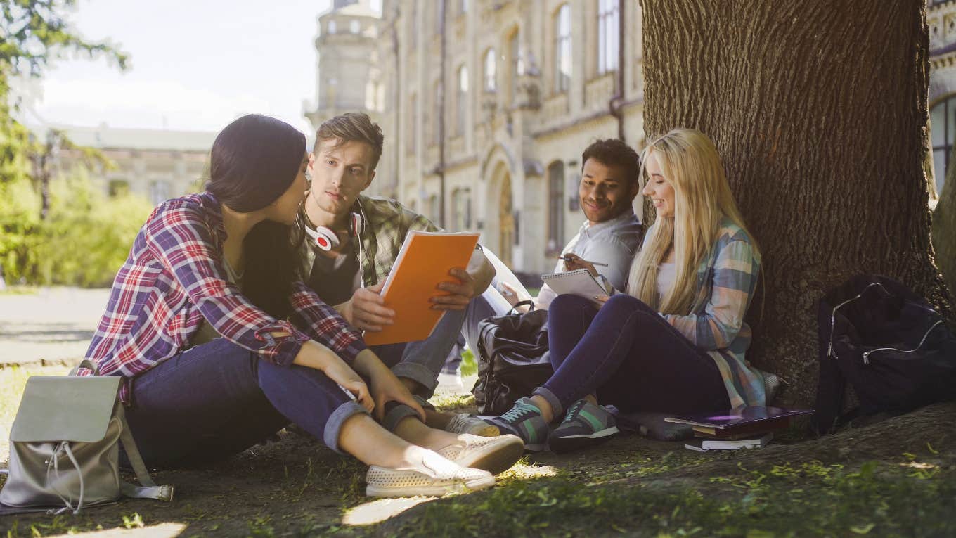college students studying together outside