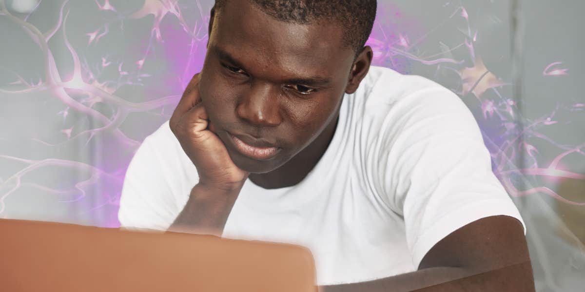 Man looking at his laptop